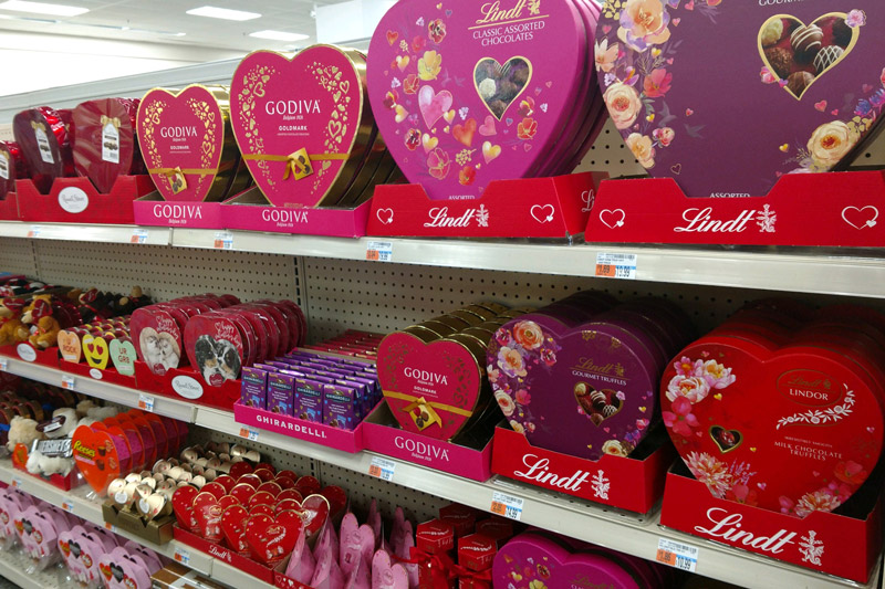 boxes of Valentine candy on shelves in store